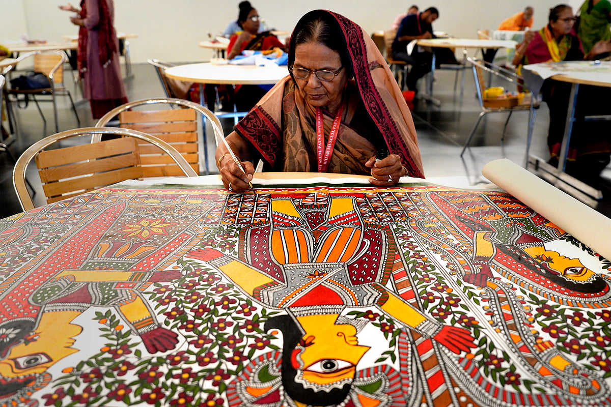SURESH K PANDEY : Padmashree awardee Baua Devi doing Mithila painting at Bihar Museum