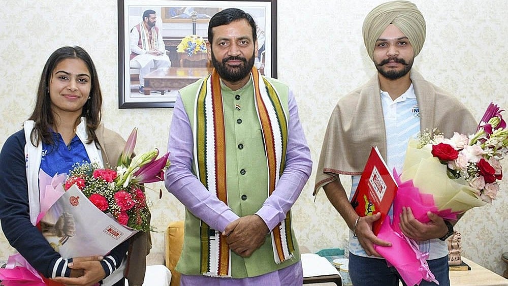 | Photo: PTI : Manu Bhaker, Sarabjot Singh alongside Haryana CM (c) Nayab Singh Saini.