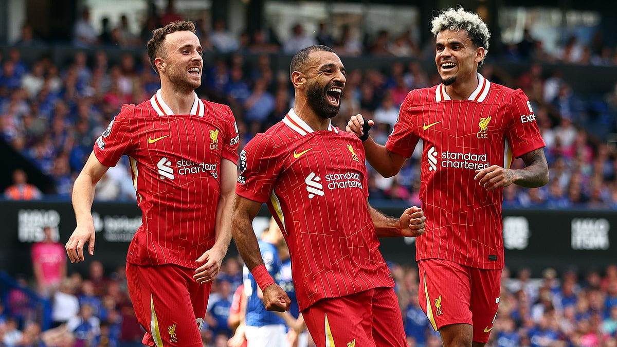 Salah (centre) celebrates with Diogo Jota and Luis Diaz - null