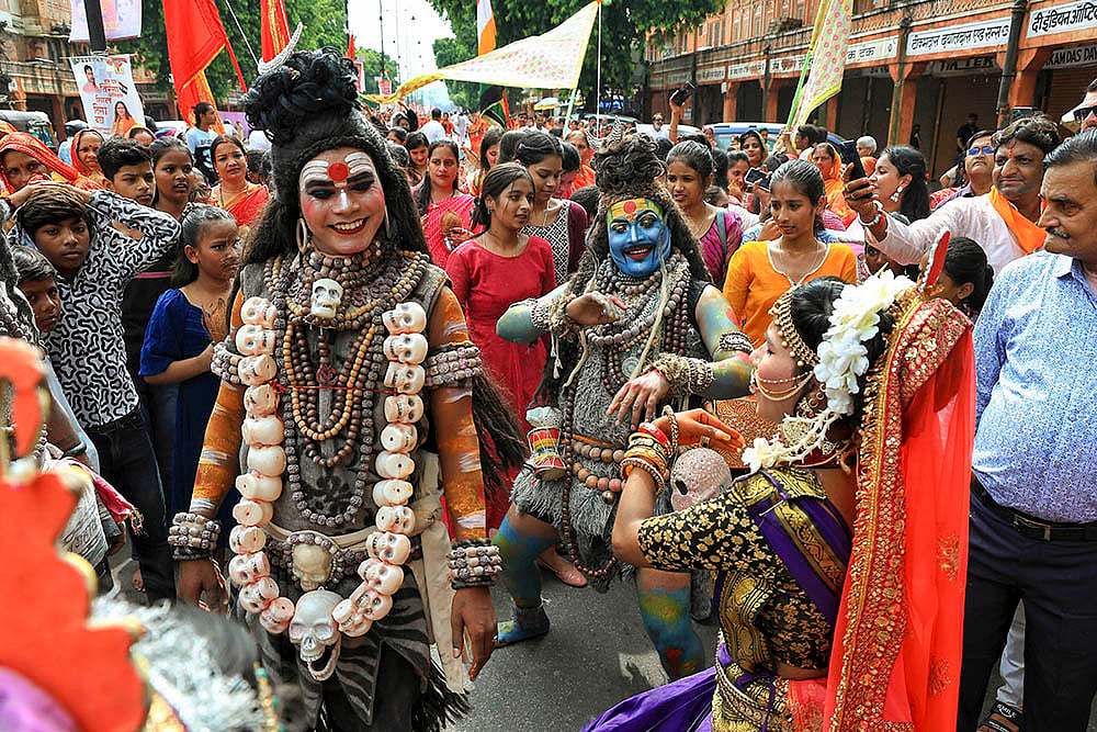 Artists during the Kalasah Yatra in the Shravan month, in Jaipur