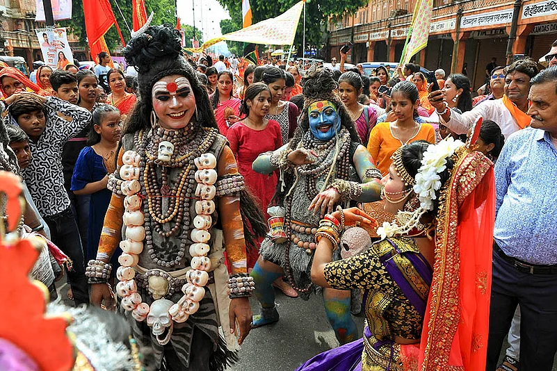 Artists during the Kalasah Yatra in the Shravan month, in Jaipur