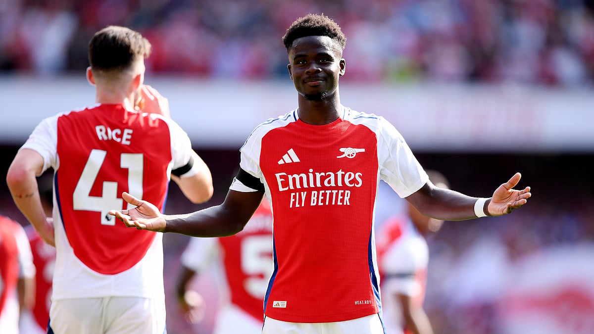 Bukayo Saka celebrates for Arsenal goal in Premier League 2024-25 opening day match against Wolves.  - null