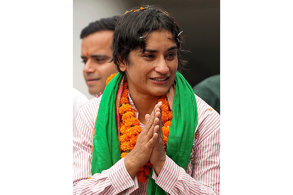 Wrestler Vinesh Phogat being welcomed on her arrival after Paris Olympics heartbreak at IGI airport