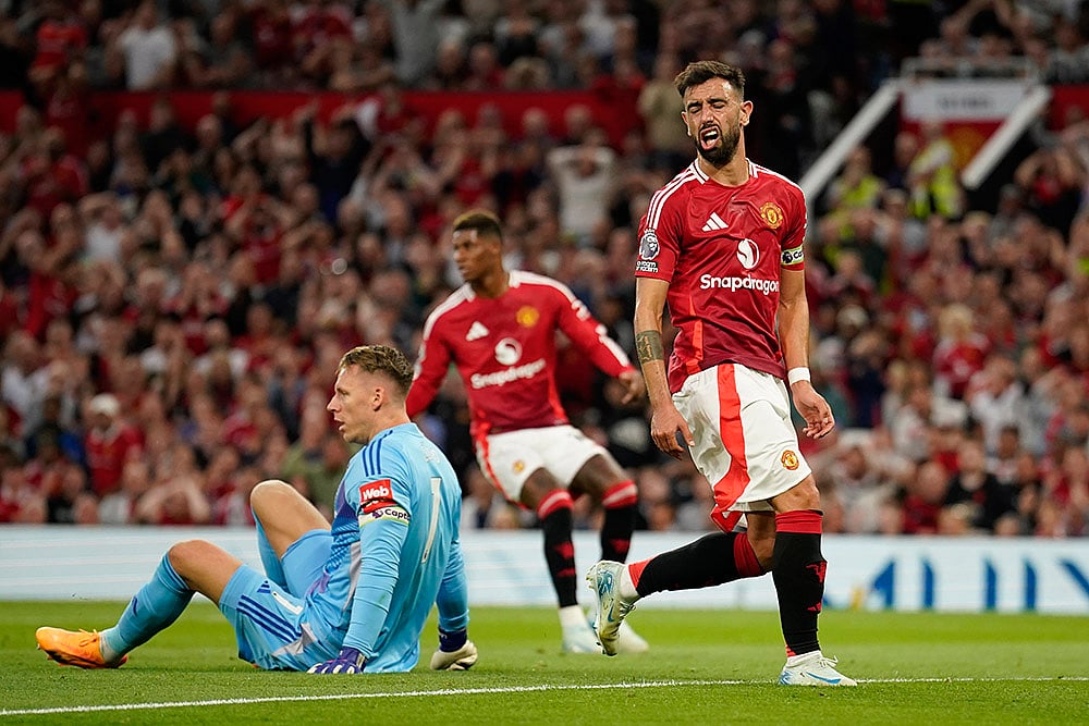 Premier League 2024-25: Manchester United Vs Fulham_Bruno Fernandes reacts after missing a chance