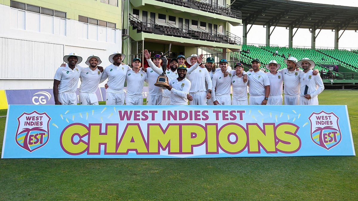 South Africa celebrate with the trophy.
