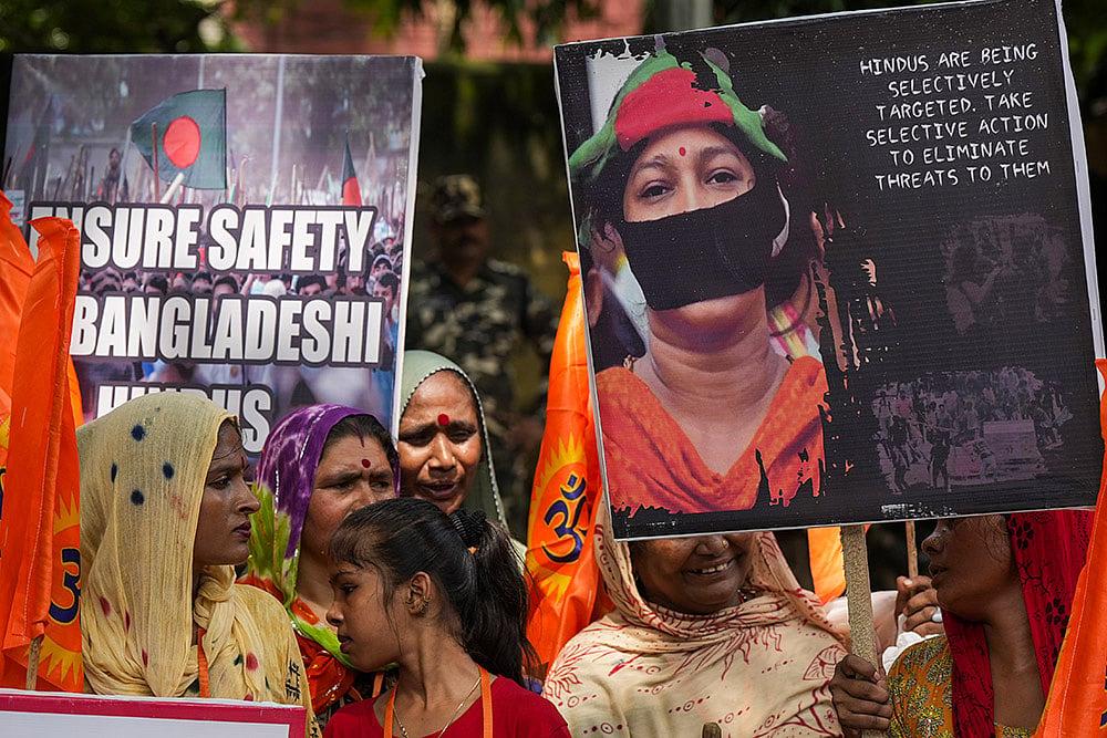 Photo: PTI/Shahbaz Khan : Protest over violence against minorities