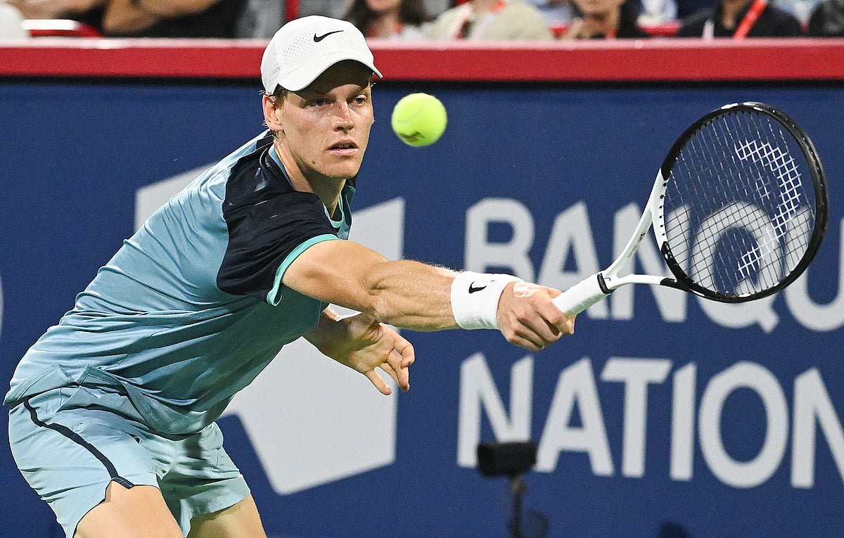 (Graham Hughes/The Canadian Press via AP)


 : Jannik Sinner, of Italy, plays a shot to Andrey Rublev, of Russia, during their quarterfinal match at the National Bank Open tennis tournament in Montreal, Saturday, Aug. 10, 2024. 