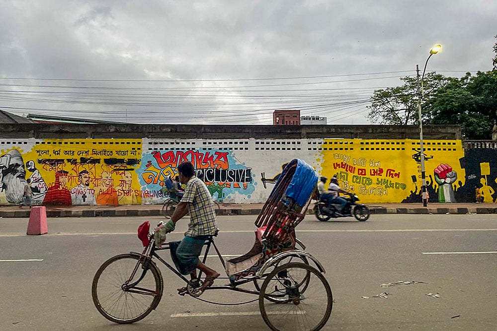 Graffiti themed on anti-government protests in Dhaka University area in Dhaka