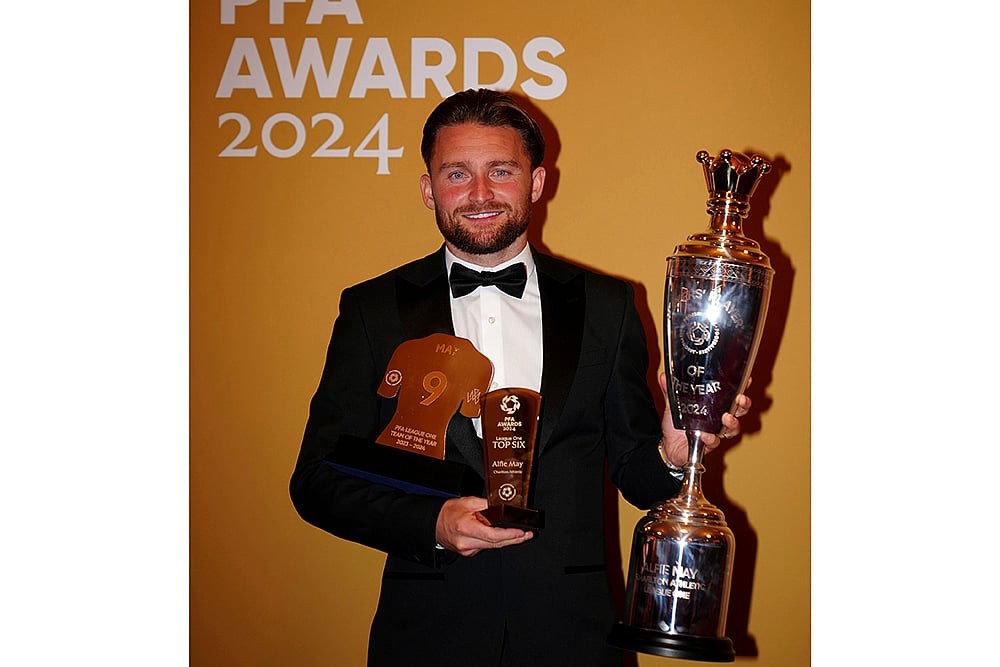2024 Britain PFA Player Awards_Alfie May poses with his PFA League One Player of the Year trophy
