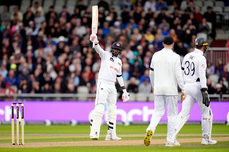 England and Sri Lanka 1st Cricket Test Day 1_Sri Lankas Milan Rathnayake celebrates half century