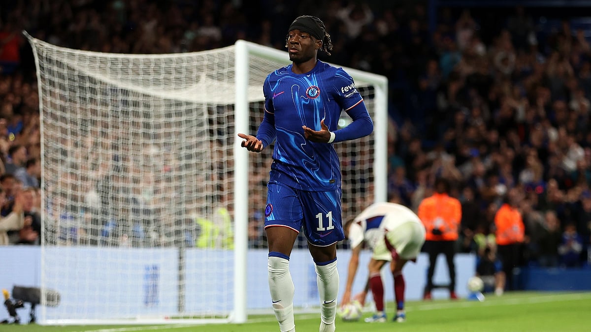 Noni Madueke celebrates after scoring against Servette