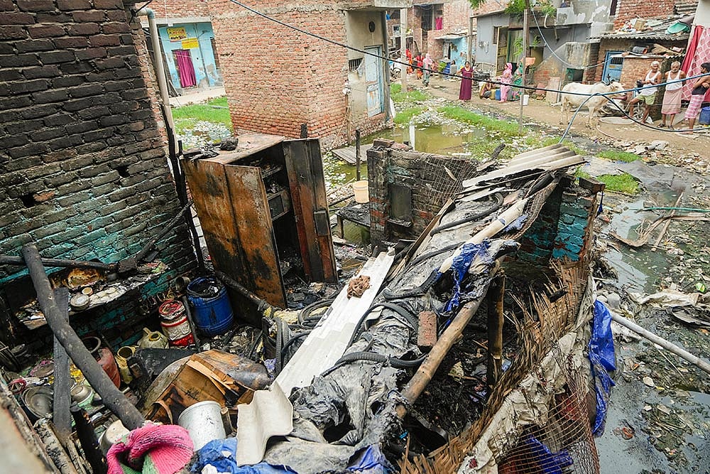 Mob burns the house of rape accused