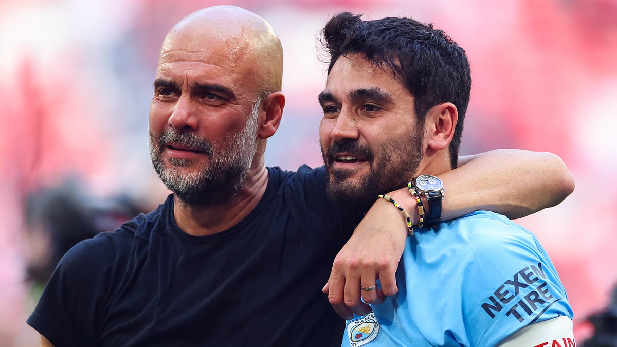 Pep Guardiola and Ilkay Gundogan pictured after the 2023 FA Cup final