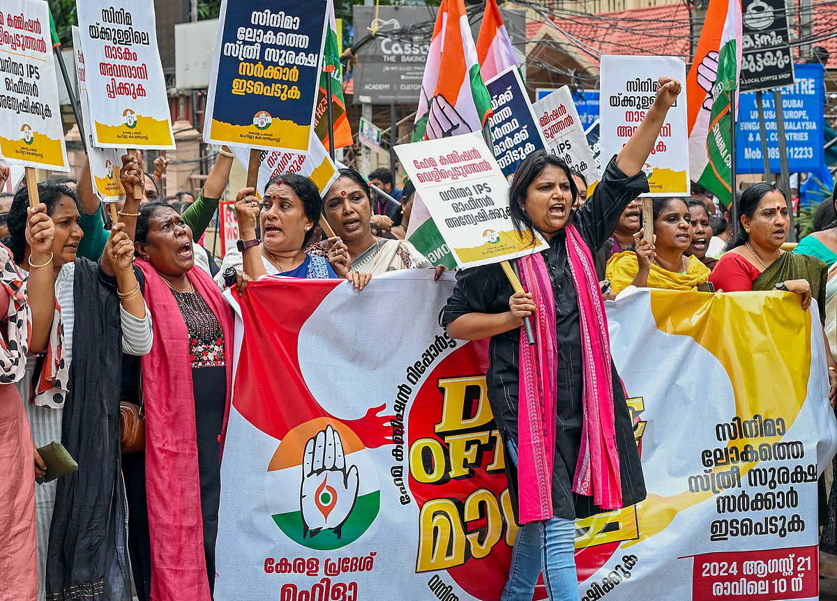 -PTI Photo : Mahila Congress activists stage a protest demanding a case against the perpetrators named in the Hema Committee report,