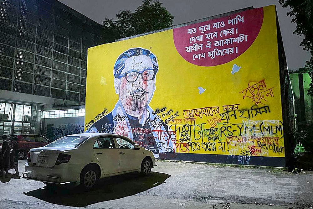 A mural depicting first president of Bangladesh Sheikh Mujibur Rahman, defaced in Dhaka