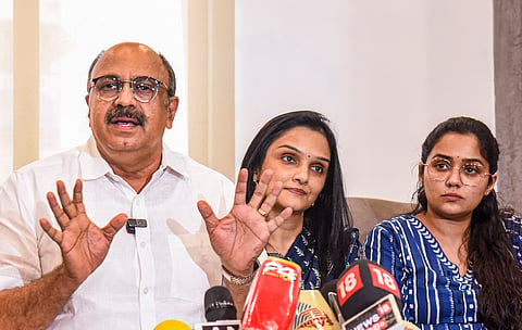 General Secretary of Association of Malayalam Movie Artists (AMMA) Siddique with actors Jomol and Ananya in Kochi