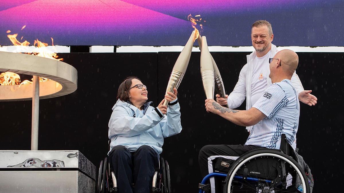 British Paralympians Helene Raynsford and Gregor Ewan light the Paralympic Flame in Stoke Mandeville, widely considered the birthplace of the Paralympic Games, England, Saturday, Aug. 24, 2024. The Paralympic Games are set to open Wednesday as some 4,400 athletes with disabilities, permanent injuries or impairments prepare to compete for 549 medals across 22 sports over 11 days in Paris.  - AP/Thomas Krych