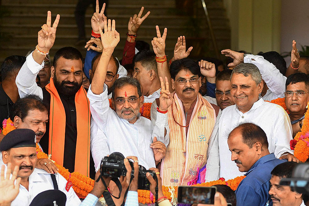 Bihar Deputy CM Samrat Chaudhary with NDA candidates Upendar Kushwaha and Manan Kumar Mishra 
