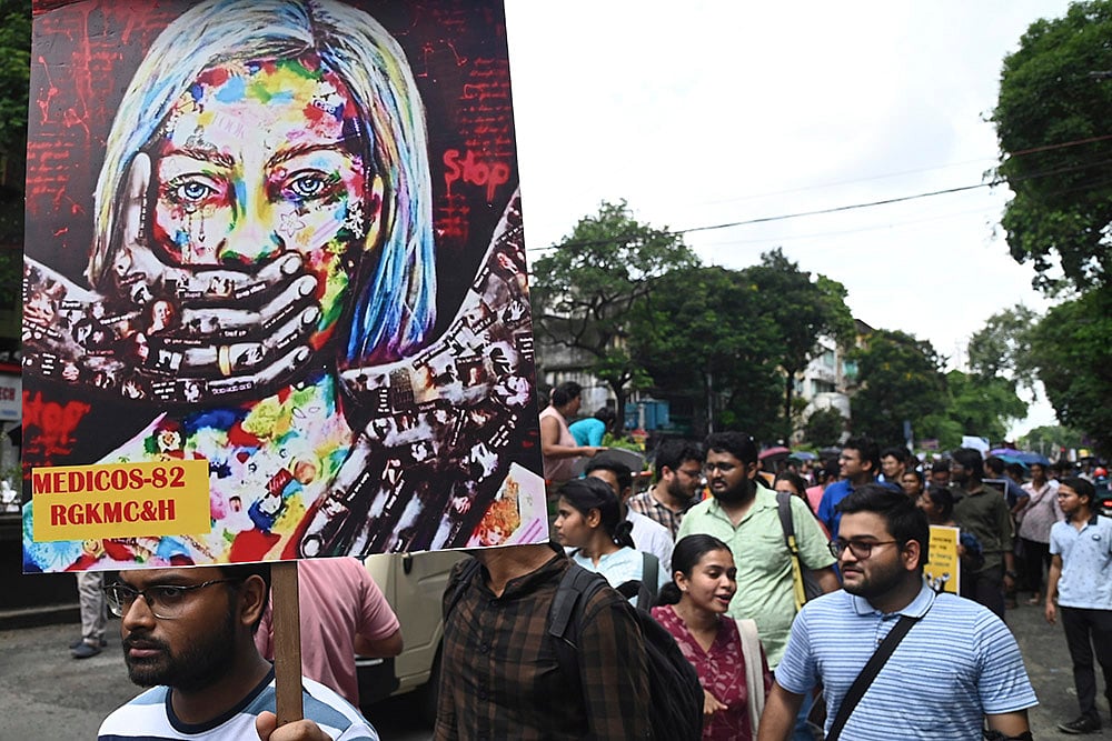 Junior doctors take part in a protest rally over Kolkata trainee doctors murder