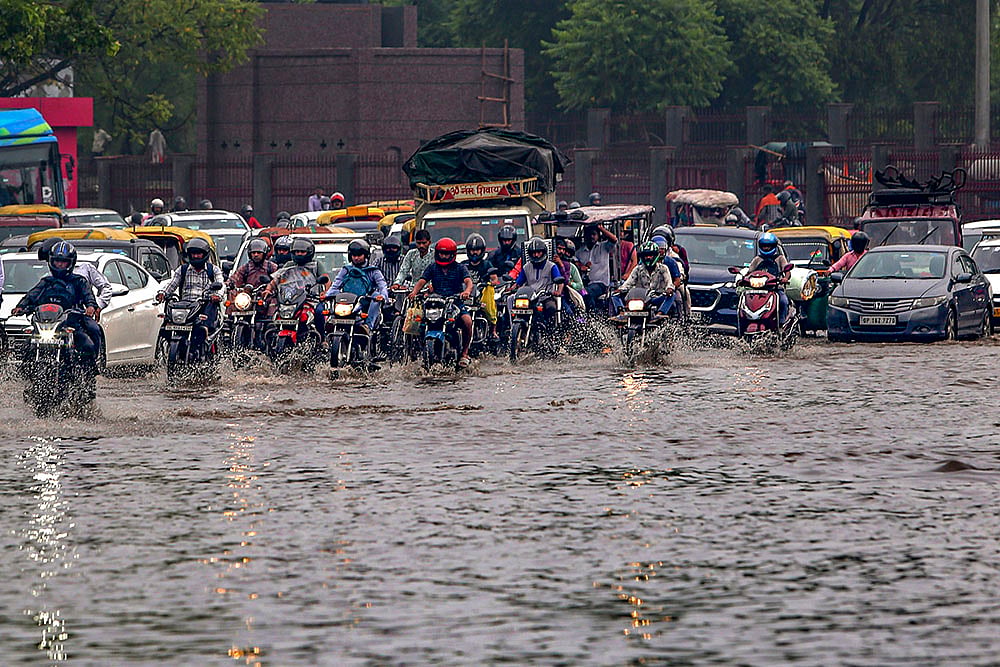 waterlogged road near Kashmere Gate area after rain in New Delhi