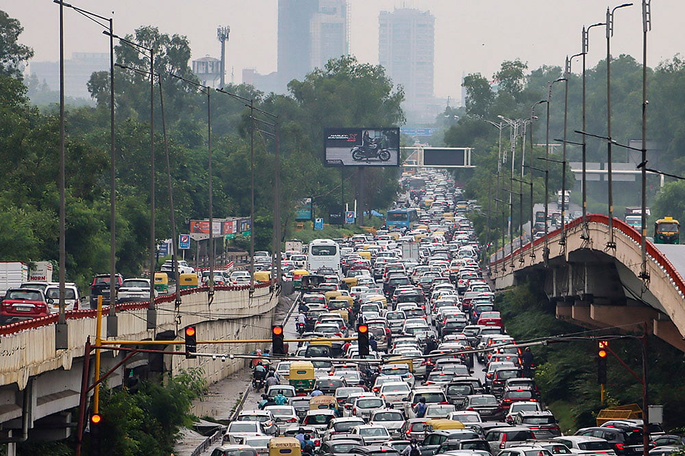 Vehicles stuck in traffic jam after rains in Delhi