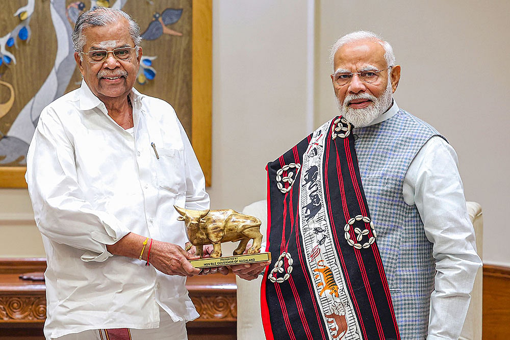 Prime Minister Narendra Modi being greeted by Nagaland Governor La Ganesan 