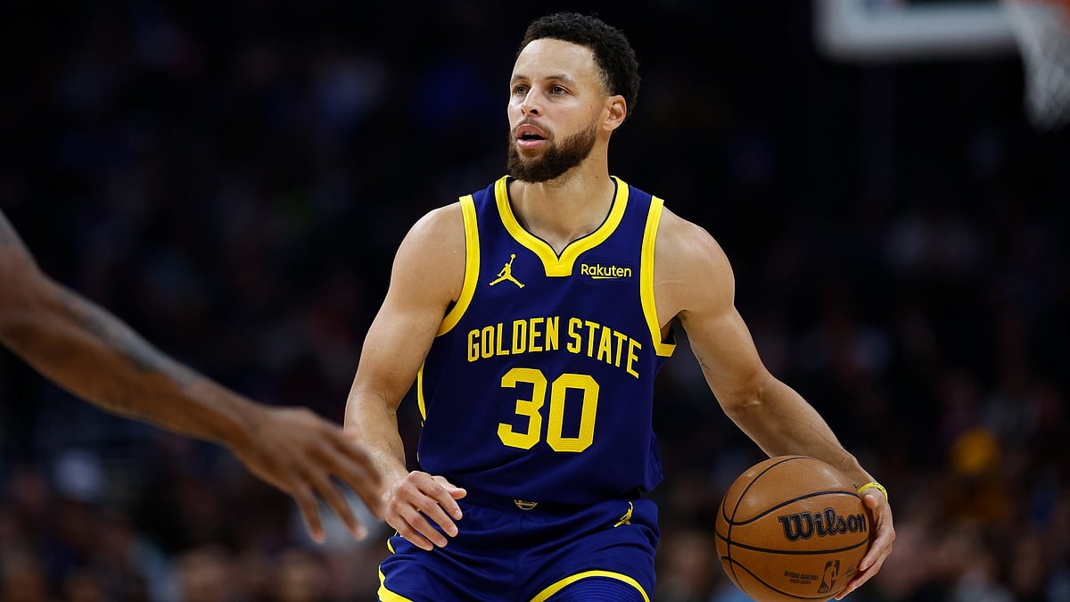 Stephen Curry's 37-point haul helped the Golden State Warriors hold off the Brooklyn Nets. - null