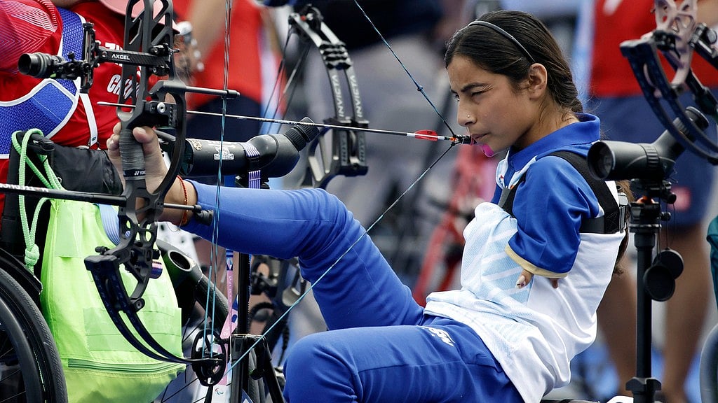 Archer Sheetal Devi from India prepares to fire during the Paralympic Games in Paris on Thursday, Aug. 29, 2024. - AP/Felix Scheyer