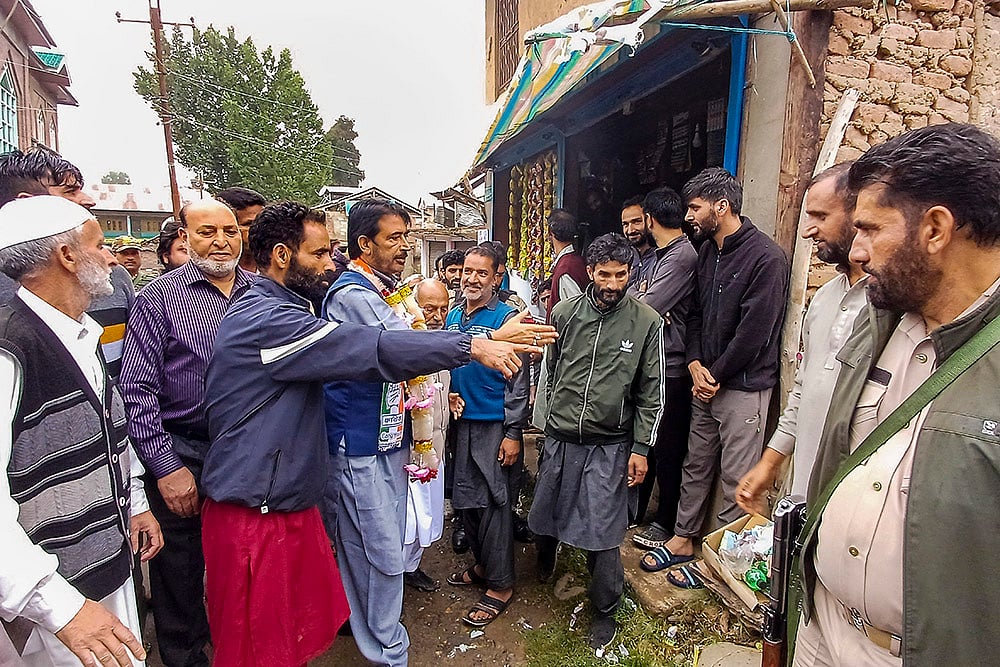 Congress leader Ghulam Ahmad Mir campaigns ahead of J& K Assembly elections