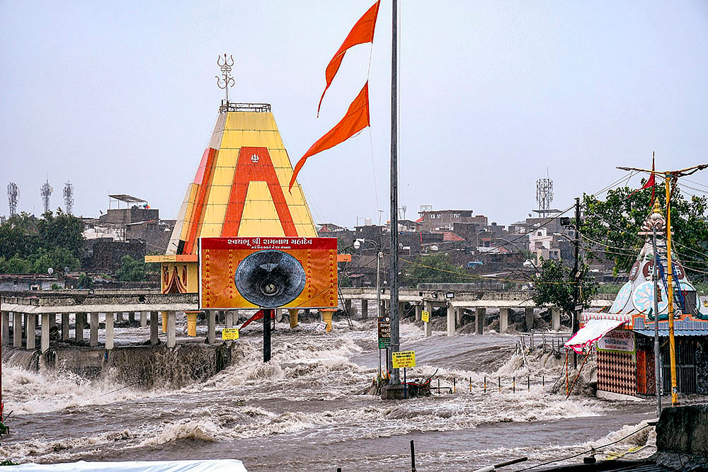 Gujarat Monsoon Rain and Floods_ Waterlogging at Ramnath Mahadev temple