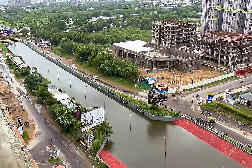 Gujarat Monsoon Rain and Floods_ Flooded SP Ring Road underbridge in Ahmedabad