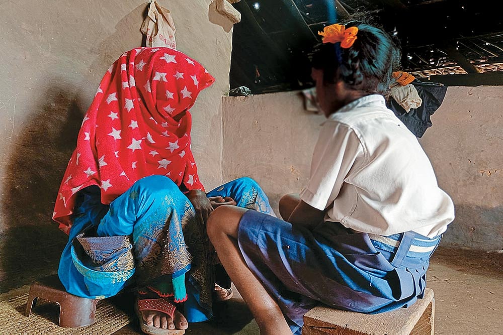 Photo: Md Asghar Khan : Just Another case: The nine-year-old survivor with her mother at their residence 