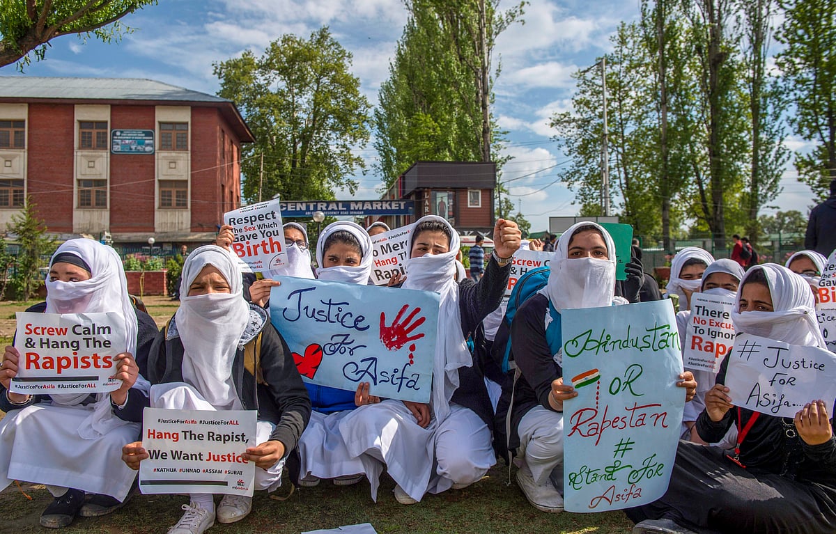 Students protest against the Kathua Rape incident in Srinagar.
