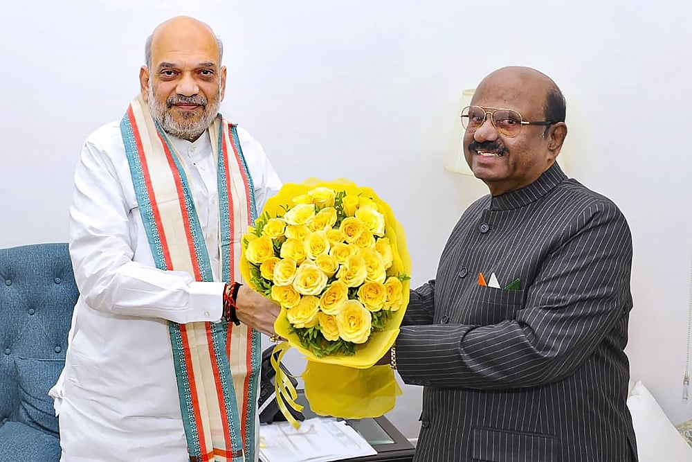 Home Minister Amit Shah during a meeting with West Bengal Governor C V Ananda Bose