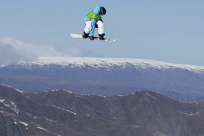 Cameron Spalding from Canada competes FIS Snowboard Slopestyle World Cup