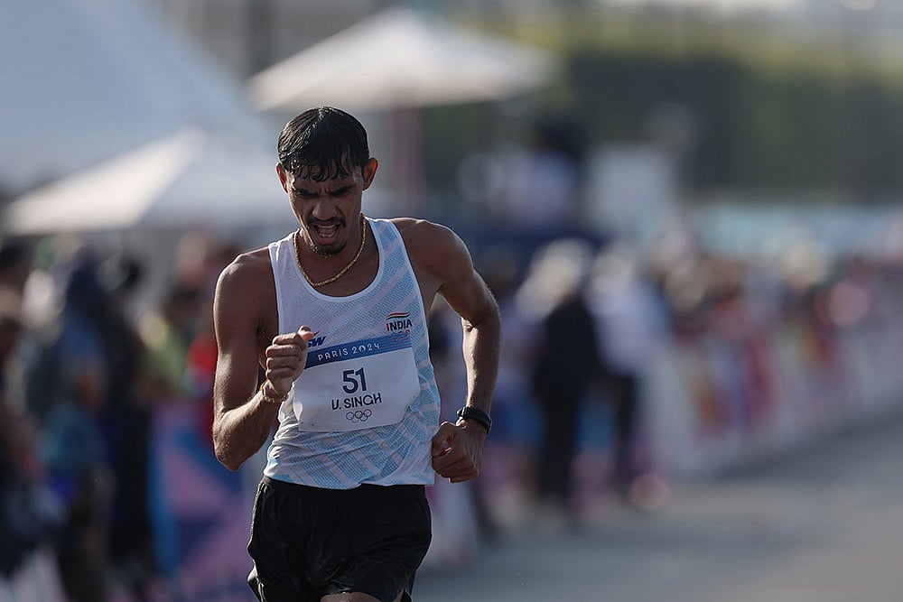 Vikash Singh of India competes during Mens 20KM Race Walk Final