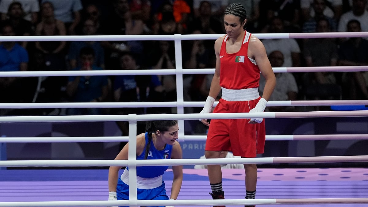 Algeria's Imane Khelif, right, defeated, Italy's Angela Carini in their women's 66kg preliminary boxing match at the 2024 Summer Olympics. - AP Photo/John Locher