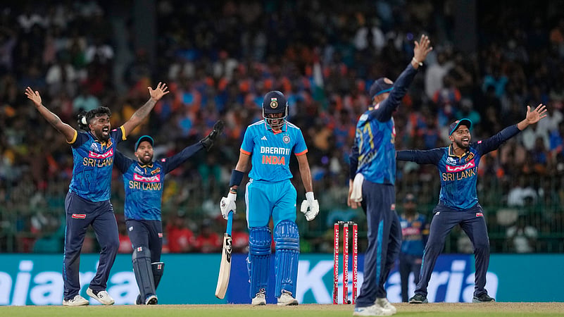 Asitha Fernando and others unsuccessfully appeal for the wicket of Indias Axar Patel. AP Photo