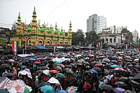 Clone of Identity Politics Drives Muslims Beyond Party Lines In West Bengal (Photo by Rupak De Chowdhuri/NurPhoto via Getty Images : Trinamool Congress (TMC) party supporters are holding umbrellas during heavy monsoon rain as they are attending a rally to commemorate the July 21, 1993 event where, according to Trinamool Congress (TMC) party leaders, 13 political party workers were killed by the police, in Kolkata, India, on July 21, 2024