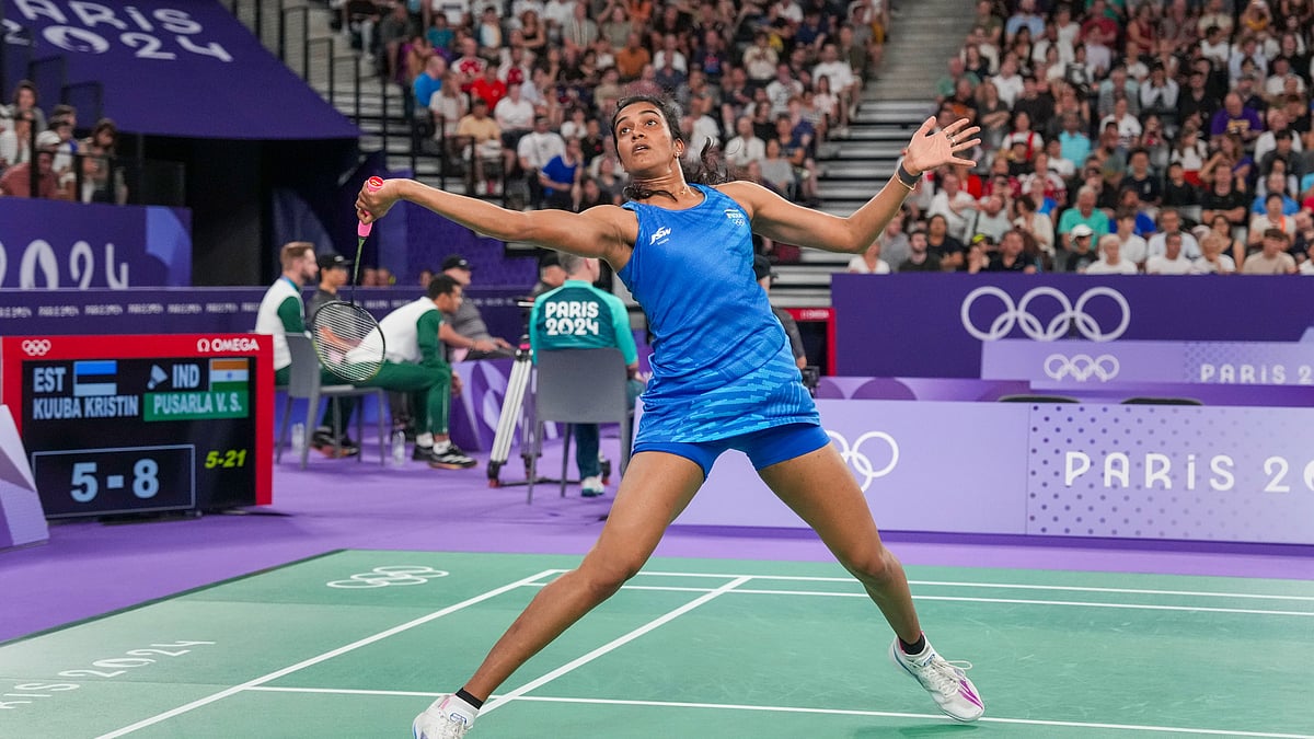 PTI Photo/Ravi Choudhary : India's PV Sindhu returns to Estonia's Kristin Kuuba during the women's singles group play stage badminton match at the 2024 Summer Olympics, in Paris.