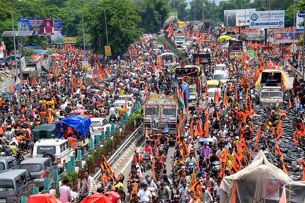 Kanwariyas return after taking Ganga river water  in Haridwar.