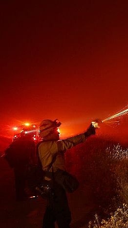 Firefighters trying to contain Park fire.