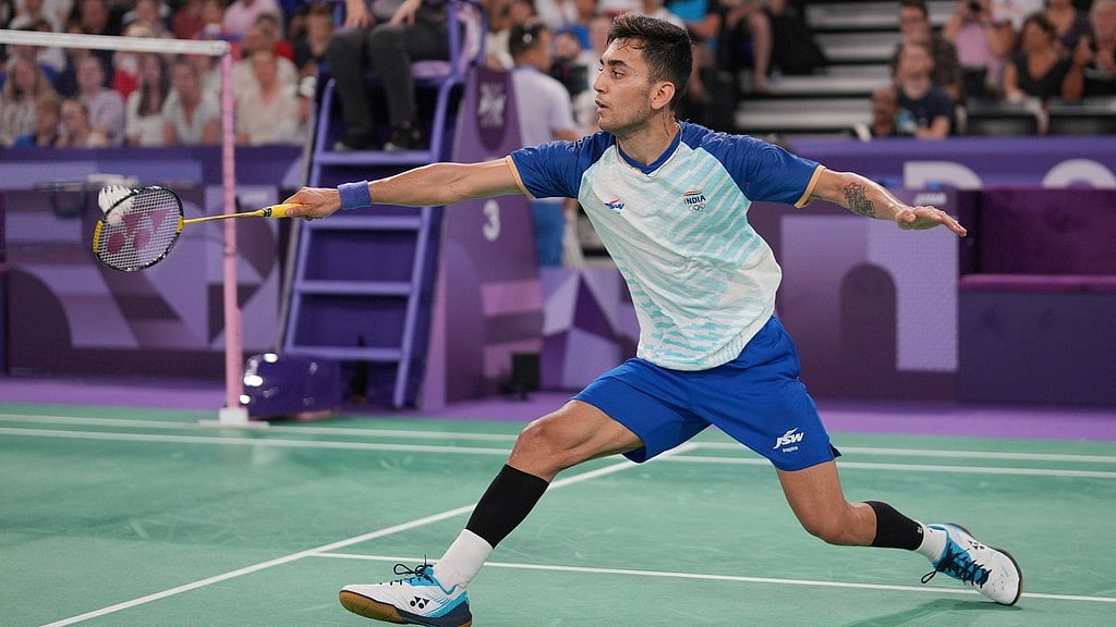 India's Lakshya Sen plays against his compatriot H.S. Prannoy during their men's singles badminton round of 16 match at the 2024 Summer Olympics. - AP/Kin Cheung