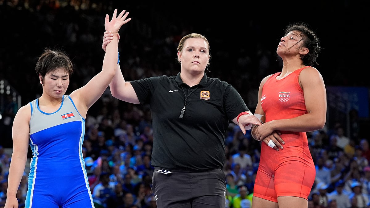 Eugene Hoshiko/AP : Nisha Dahiya loses her quarter-final bout to Sol Gum Pak at the Paris Games 2024