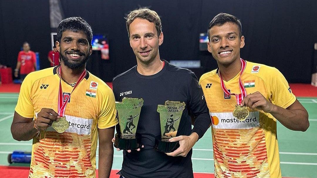 Satwiksairaj Rankireddy and Chirag Shetty with Mathias Boe - X/India_AllSports