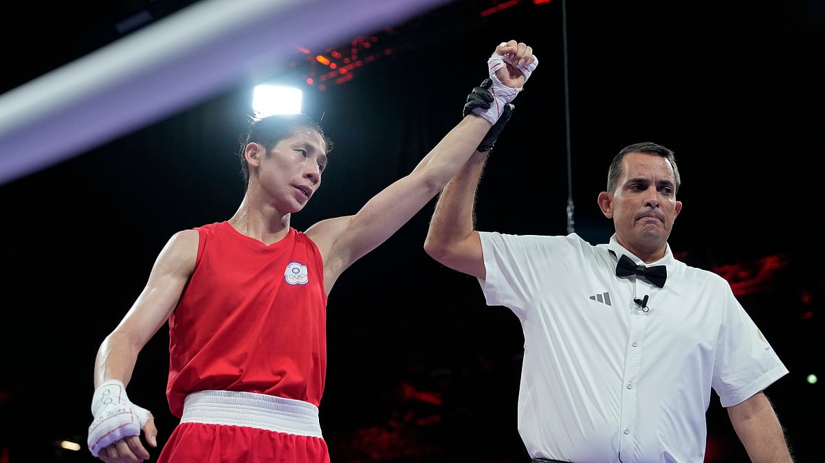 Taiwan's Lin Yu-ting reacts after defeating Uzbekistan's Sitora Turdibekova in their women's 57 kg preliminary boxing match at the 2024 Summer Olympics, Friday, Aug. 2, 2024, in Paris, France. - (AP Photo/Ariana Cubillos)