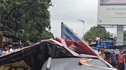X/PTI : Billboard collapses in Pune on Friday |