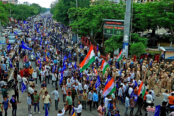 Bhim Sena activists hold a protest rally against the Supreme Court