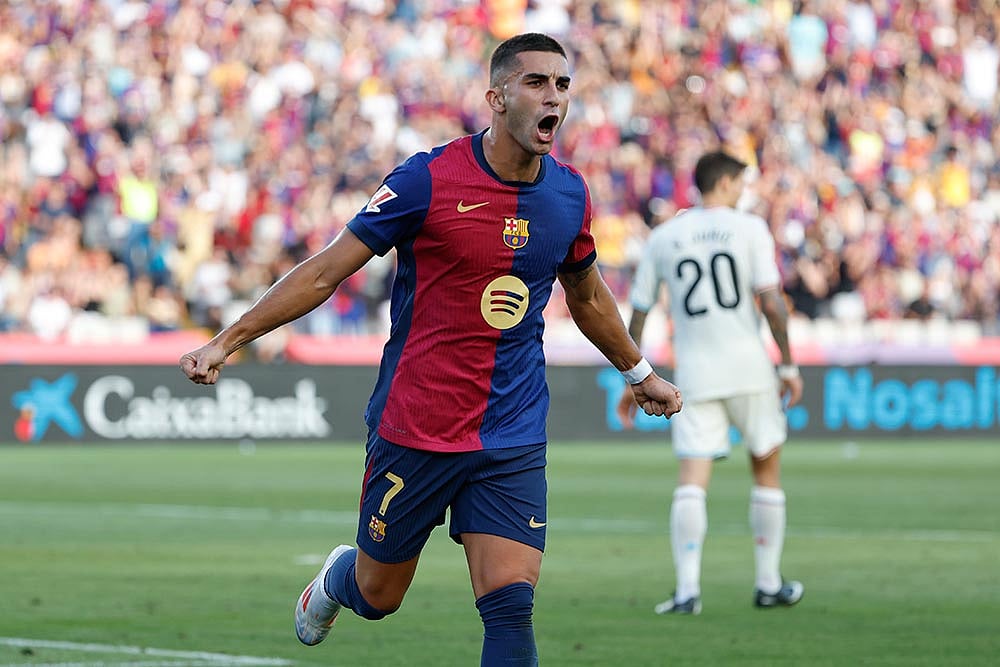 Photo: AP/Joan Monfort : Spain Soccer La Liga