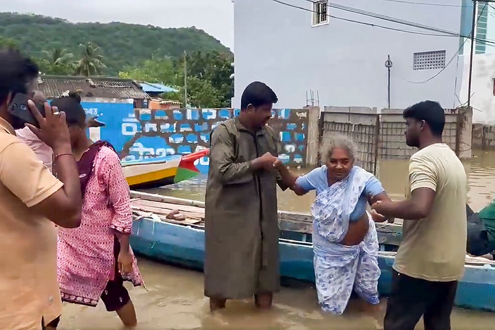 Evacuation and relief work underway at Flood hit Tadepalli Mahanadu